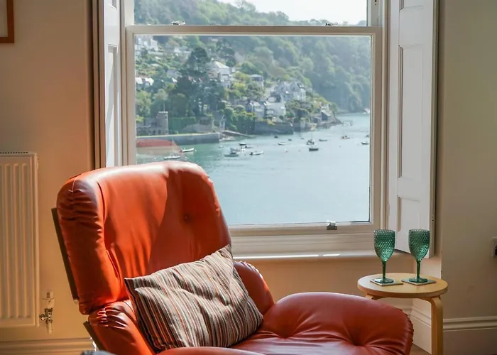 Riverside Apartment With Stunning Views & Patio